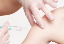 braccio vaccino siringa